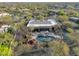 Gorgeous aerial view of the backyard oasis with pool, hot tub, and putting green at 8167 E Sand Flower Dr, Scottsdale, AZ 85266