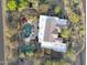 Stunning aerial view highlighting backyard oasis including a pool, spa, and putting green at 8167 E Sand Flower Dr, Scottsdale, AZ 85266