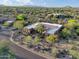 Stunning aerial view of home showcasing desert landscaping with majestic mountain views at 8167 E Sand Flower Dr, Scottsdale, AZ 85266