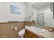 Cozy bathroom featuring a large mirror, and a shower behind sliding glass doors at 8167 E Sand Flower Dr, Scottsdale, AZ 85266