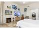 Bright bedroom features tile floors, multiple windows, and tasteful decor at 8167 E Sand Flower Dr, Scottsdale, AZ 85266