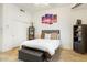 Comfortable bedroom with tiled flooring, artwork, and great natural light at 8167 E Sand Flower Dr, Scottsdale, AZ 85266