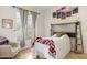 Inviting bedroom with neutral colors, and a large window offering ample light at 8167 E Sand Flower Dr, Scottsdale, AZ 85266