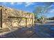 Spacious three car garage with adjacent desert landscaping at 8167 E Sand Flower Dr, Scottsdale, AZ 85266