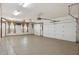 Spacious three car garage with epoxy flooring, and overhead storage at 8167 E Sand Flower Dr, Scottsdale, AZ 85266