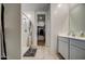 Bathroom featuring a walk-in shower and vanity with a view to the walk-in closet at 1157 W Paradise Way, Casa Grande, AZ 85122