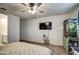 Bright bedroom with a ceiling fan, natural light and unique decor elements at 1157 W Paradise Way, Casa Grande, AZ 85122