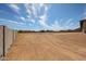 Large, open lot with block wall for added privacy, ideal for creating your dream outdoor space at 1101 E Dolores Rd, Phoenix, AZ 85086
