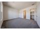 Light bedroom featuring an ensuite bathroom and large closet at 1101 E Dolores Rd, Phoenix, AZ 85086