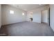 Open bedroom featuring neutral color palette, recessed lights and an ensuite bathroom at 1101 E Dolores Rd, Phoenix, AZ 85086