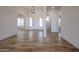 Welcoming entryway featuring wood-look floors and a stylish light fixture at 1101 E Dolores Rd, Phoenix, AZ 85086