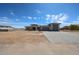 Stunning single-story home with a paved driveway and a spacious three car garage at 1101 E Dolores Rd, Phoenix, AZ 85086