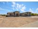 Beautiful single-Gathering home showcasing a blend of stone accents and a three-car garage, offering both style and practicality at 1101 E Dolores Rd, Phoenix, AZ 85086