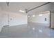 Spacious garage with epoxy floor and ample storage space at 1101 E Dolores Rd, Phoenix, AZ 85086