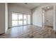 Open living space with sliding glass doors and modern tile flooring at 1101 E Dolores Rd, Phoenix, AZ 85086