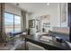 Bright office space with modern furniture and large window at 1101 E Dolores Rd, Phoenix, AZ 85086