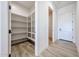 Walk-in pantry with open shelving, providing ample storage space at 1101 E Dolores Rd, Phoenix, AZ 85086