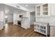 Modern kitchen with stainless steel range and white shaker cabinets at 8320 E Quill St, Mesa, AZ 85207