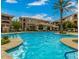 Community pool with surrounding lounge area at 11640 N Tatum Blvd # 2012, Phoenix, AZ 85028