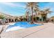 Relaxing community pool area with palm trees at 11640 N Tatum Blvd # 2012, Phoenix, AZ 85028