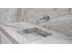 Contemporary bathroom vanity featuring sleek marble countertop and modern faucet fixture at 7127 E Rancho Vista Dr # 4012, Scottsdale, AZ 85251