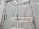 Modern bathroom shower with beautiful marble tile and a glass door adds elegance at 7127 E Rancho Vista Dr # 4012, Scottsdale, AZ 85251