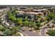 A beautiful multi-story condo building with lush greenery on the balconies and surrounding areas creates an inviting atmosphere at 7127 E Rancho Vista Dr # 4012, Scottsdale, AZ 85251