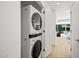Convenient laundry closet with a stacked washer and dryer unit at 7127 E Rancho Vista Dr # 4012, Scottsdale, AZ 85251