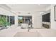 Stylish living room featuring a marble fireplace, a large white sofa, and great natural light at 7127 E Rancho Vista Dr # 4012, Scottsdale, AZ 85251