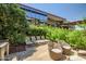 Relaxing outdoor patio with comfortable lounge seating and lush greenery at 7127 E Rancho Vista Dr # 4012, Scottsdale, AZ 85251