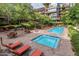 Gorgeous pool and spa area with lounge chairs and mature landscaping offer relaxation and recreation at 7127 E Rancho Vista Dr # 4012, Scottsdale, AZ 85251