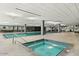 Indoor pool with hot tub and lounge area at 7127 E Rancho Vista Dr # 4012, Scottsdale, AZ 85251