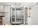 Modern, stainless steel refrigerator with open doors and pull-out shelves at 7127 E Rancho Vista Dr # 4012, Scottsdale, AZ 85251