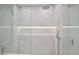 Elegant shower featuring marble walls, glass doors, and a rainfall showerhead at 7127 E Rancho Vista Dr # 4012, Scottsdale, AZ 85251
