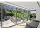 Bright sunroom with expansive windows offering serene views of the lush outdoor greenery at 7127 E Rancho Vista Dr # 4012, Scottsdale, AZ 85251