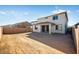 Large backyard featuring a blank slate ready for landscaping and outdoor activities at 17632 W Oregon Ave, Litchfield Park, AZ 85340