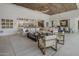 Open living area with sectional sofa and large windows at 24863 N 103Rd N Way, Scottsdale, AZ 85255
