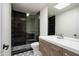 Modern bathroom with hexagon tile floor and walk-in shower at 7917 E Bonnie Rose Ave, Scottsdale, AZ 85250