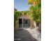 Open patio with bi-fold doors leading into living area at 7917 E Bonnie Rose Ave, Scottsdale, AZ 85250