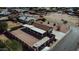 Aerial view of house showcasing the backyard, driveway and surrounding neighborhood at 8702 E Boise St, Mesa, AZ 85207