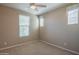 Bright bedroom with ceiling fan and large window at 17983 E Vista Desierto --, Rio Verde, AZ 85263