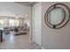 Bright hallway with a large mirror and view into living room at 17983 E Vista Desierto --, Rio Verde, AZ 85263