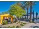 Relaxing poolside space with yellow cabanas and lounge chairs at 17983 E Vista Desierto --, Rio Verde, AZ 85263