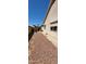 Backyard with gravel landscaping and AC unit at 2605 N 133Rd Ave, Goodyear, AZ 85395