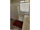 Bathroom with walk-in shower, glass block window, and vanity at 2605 N 133Rd Ave, Goodyear, AZ 85395