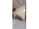 Garage with ample storage cabinets and bike at 2605 N 133Rd Ave, Goodyear, AZ 85395