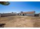A spacious backyard provides privacy and low maintenance desert landscaping at 3222 W Wagoner Rd, Phoenix, AZ 85053