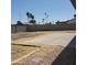 Large backyard showcasing a concrete patio area and block wall, offering a blank canvas for personalization at 3222 W Wagoner Rd, Phoenix, AZ 85053