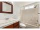 Clean bathroom featuring a sink with wood cabinets and a shower-tub combination at 3222 W Wagoner Rd, Phoenix, AZ 85053