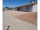 Single-story home featuring desert landscaping, a concrete driveway, and attached garage at 3222 W Wagoner Rd, Phoenix, AZ 85053